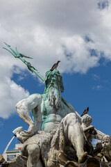 Berlin, Germany - July 01, 2018: Fragment of the Neptune Fountain in the center of Berlin