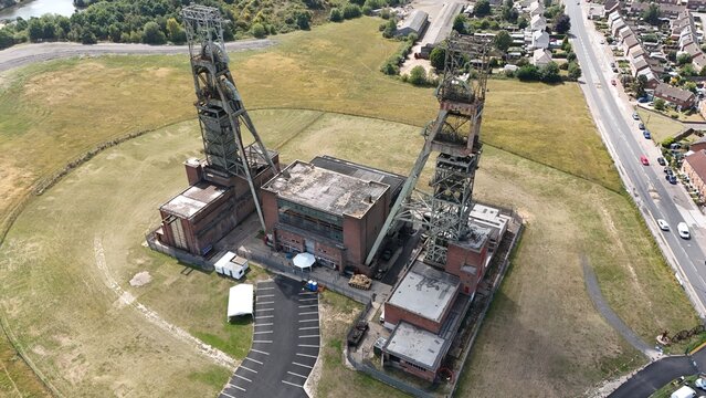Aerial top down shot of Clipstone Colliery, legacy building extracting coal and ore, earth minerals in Nottingham England UK