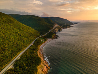 winding road through the forest . View from top of a cliff. Nova scotia canada.