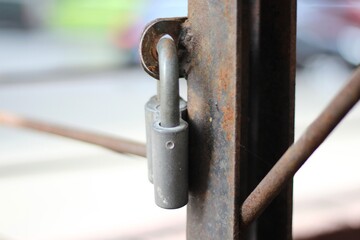 Locked metal gates fence and metal lock outdoor photo summer	
