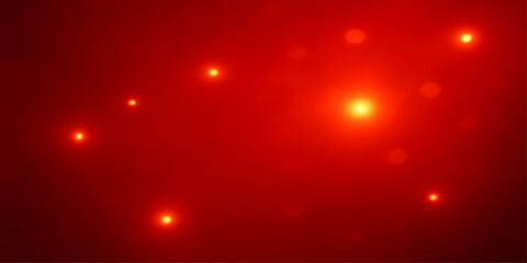 Sparkling red holiday lights glow with a soft bokeh effect on a festive Christmas background