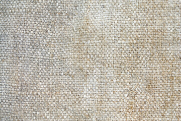 Clean light brown burlap texture background. Natural rustic woven jute fabric for organic, eco, or...