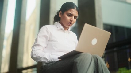 Worried young indian woman with crossed fingers while get notification email and feeling upset reading bad negative news message outdoors Disappointment concept - Powered by Adobe