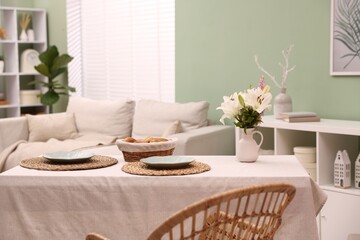 Stylish table with chair and decor in dining room. Interior design