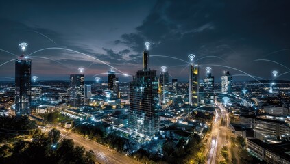 Night cityscape, illuminated by city lights.  Wireless network connections shown by light trails.  Modern high-rise buildings