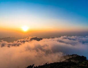 An ethereal mountain landscape at dusk is painted in a beautiful symphony of orange and red