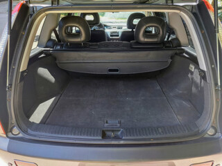 Spacious car trunk ready for whimsical road trips, reminiscent of a cozy mobile nest, perfect for Siblings Day adventures