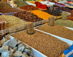 Kaleidoscopic spice bazaar bursts with chromatic powders and aromatic gems, echoing Navaratri...