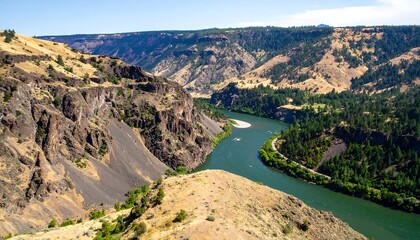 Fototapeta premium High-angle view of a river winding through a canyon