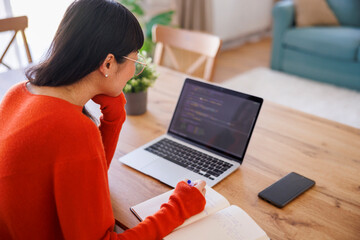 Asian woman taking an online IT course