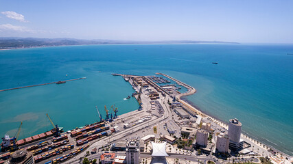Aerial Bird's eye view of Albanian city Durres. Buildings and beach along Adriatic sea coast.