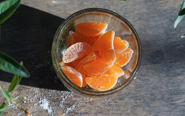 Dried mandarin kernels in a crystal bowl