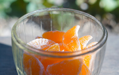 Dried mandarin kernels in a crystal bowl