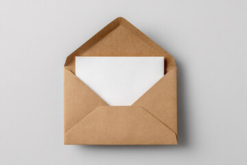 Open Kraft Envelope with Blank Card Inside on a Neutral Background - Top View