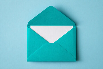 Teal Envelope with White Paper on Blue Background, Minimalist Style