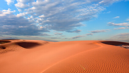 Panoramic view of orange sand dune desert with orange mountains and hill - Namib desert, Namibia