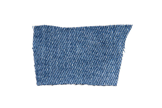 scraps of blue jeans piece texture isolated on white background.