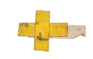 Old condition yellow sticker isolated on white background.