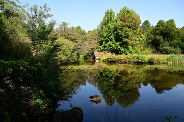 A boat house on a lake at a country house in the UK.