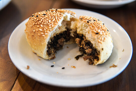 Kompia or kompyang, also known as guang bing, bread product made with lard, onions, salt and flour.