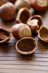 hazelnuts on wooden background macro shot