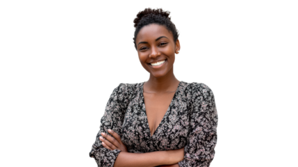 Portrait of a smiling Black woman with arms crossed against a white background, cut out transparent