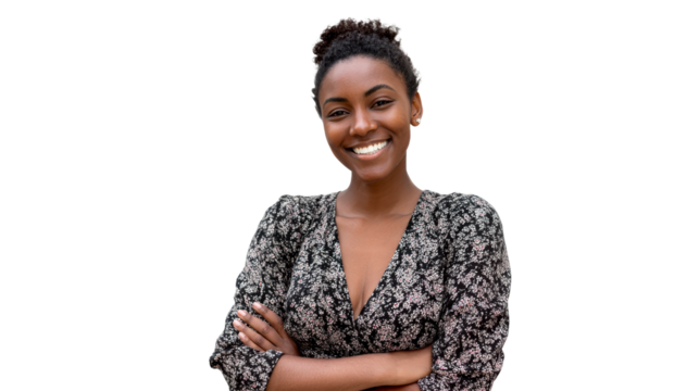 Portrait of a smiling Black woman with arms crossed against a white background, cut out transparent