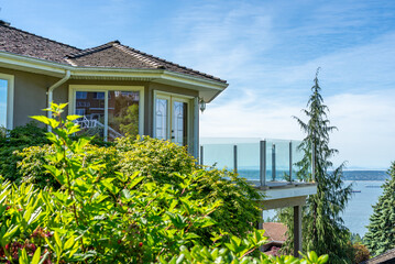 Top of luxury house with shingle roof and nice windows in Summer in Vancouver, Canada, North...