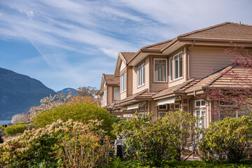 Top of luxury house with shingle roof and nice windows in Summer in Vancouver, Canada, North...