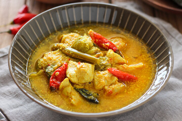 Ayam garang asem. Chicken with sour and spicy soup. perfect for recipe, article, or any commercial purposes.