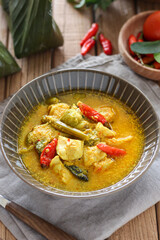 Ayam garang asem. Chicken with sour and spicy soup. perfect for recipe, article, or any commercial purposes.