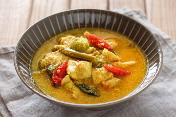 Ayam garang asem. Chicken with sour and spicy soup. perfect for recipe, article, or any commercial purposes.