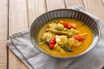 Ayam garang asem. Chicken with sour and spicy soup. perfect for recipe, article, or any commercial purposes.