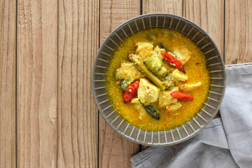 Ayam garang asem. Chicken with sour and spicy soup. perfect for recipe, article, or any commercial purposes.