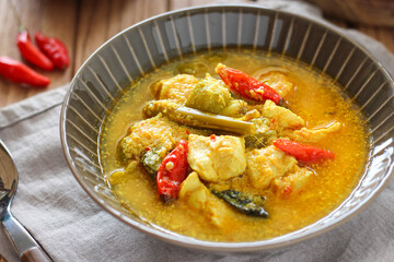 Ayam garang asem. Chicken with sour and spicy soup. perfect for recipe, article, or any commercial purposes.