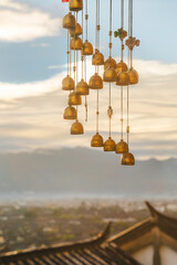Hanging Bells and Mountain View at Sunrise, Lijiang Old Town, China