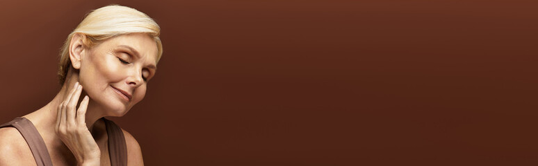 Fototapeta premium Celebrating beauty and wisdom in serene moments with an elegant senior woman