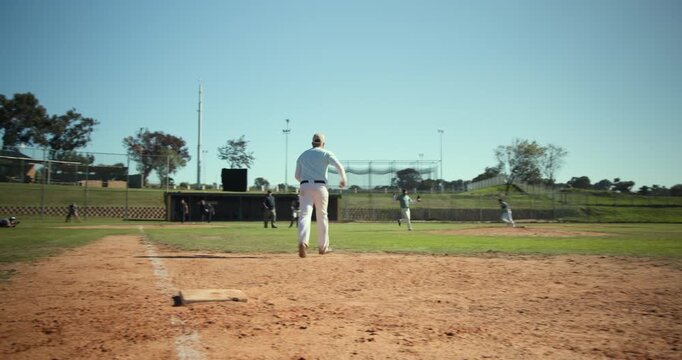 Ground ball to first prompting man fielding baseball, forcing runner out, batter jogging in