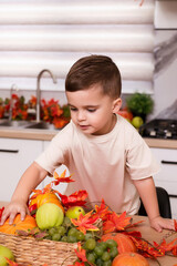 Child Playing with Autumn Harvest