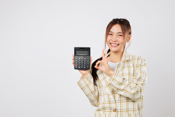 Confident accountant woman presents calculator while holding another calculator, giving OK sign to...