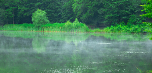 Morning fog on the lake. Beautiful view. Gosh lake. Armenia