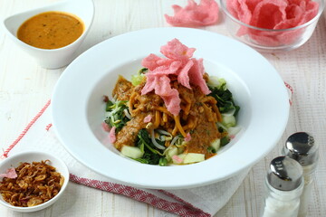 Mie pecel medan. Noodle with peanut sauce and boiled vegetables originated from North Sumatera, Indonesia.