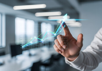 A person's hand interacting with a digital graph, pointing towards upward growth.
