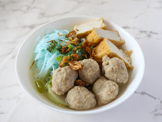 Bakso. A bowl of Indonesian meatball with noodle and tofu.