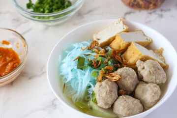 Bakso. A bowl of Indonesian meatball with noodle and tofu.