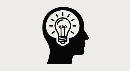 Silhouette of a head with a lightbulb inside, symbolizing creativity and ideas.