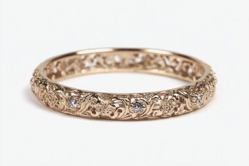 Delicate gold ring with intricate filigree