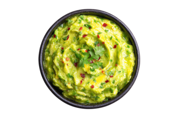 Fresh guacamole in a black bowl isolated on transparent background