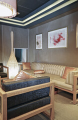 Softly padded loungers inside relaxation tea room in thermal suite wellness area onboard luxury...