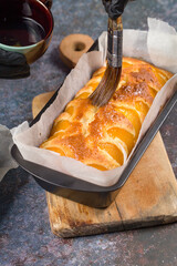 Rub the Cake with Peach Syrup
